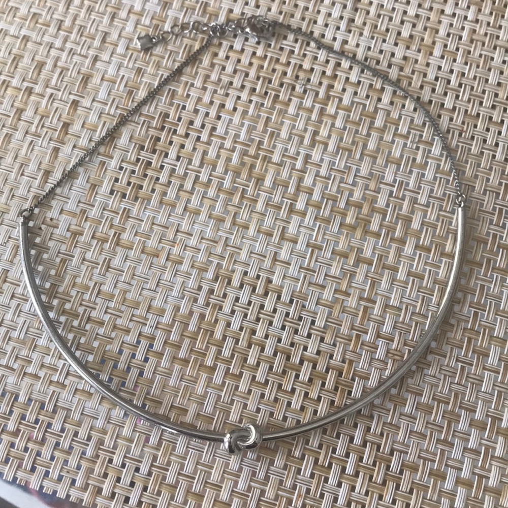 Silver tone knot necklace